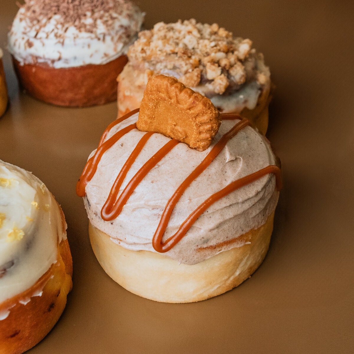 Fresh cinnamon roll being served